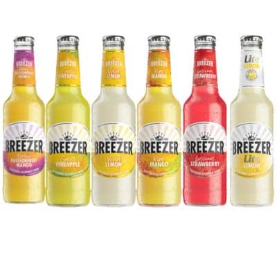 A collection of Breezer ready-to-drink cocktails in various flavors, including Passionfruit Mango, Sweet Pineapple, Vivid Lemon, Ripe Mango, Luscious Strawberry, and Lite Lemon.