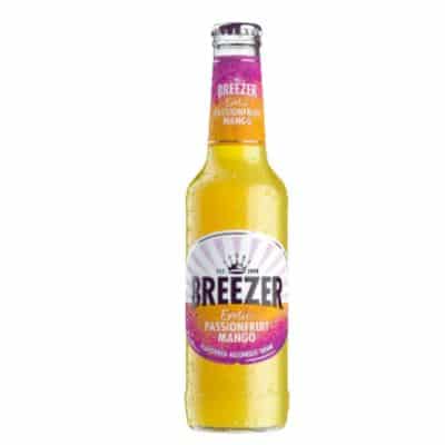 A bottle of Breezer Exotic Passionfruit Mango, a refreshing pre-mixed cocktail of rum, passionfruit, and mango.