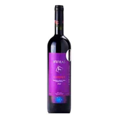 A glass of Kikones Ippeas Red wine with a rich red color.